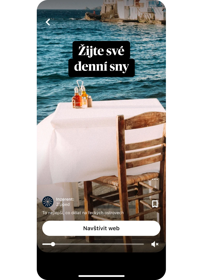 Miniatura náhledu nápadové reklamy zobrazující jídelní stůl s výhledem na moře s názvem „Live your dream“ a tlačítkem „Visit site“ umístěným dole uprostřed.