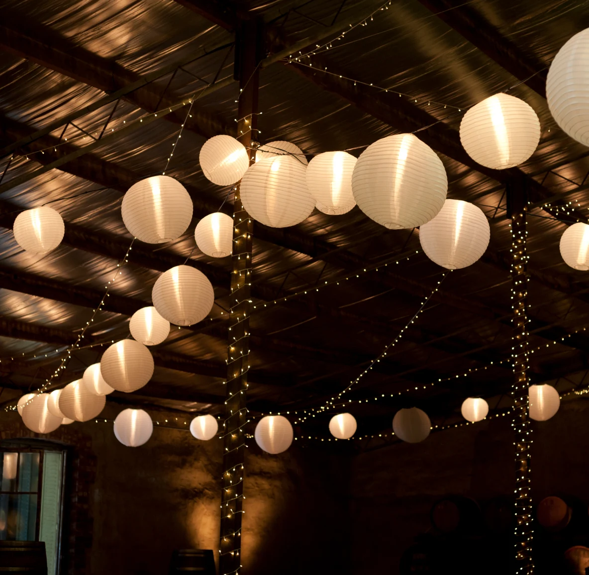 A string of Chinese white paper lanterns