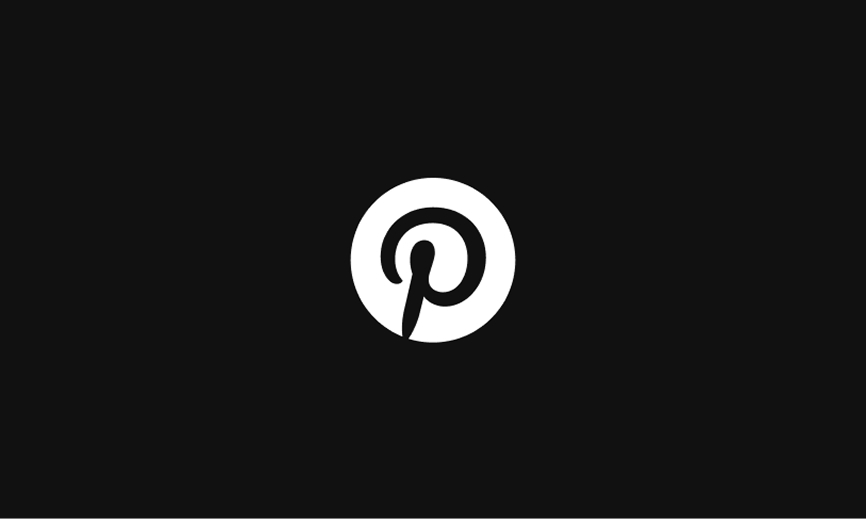 A black Pinterest logo circled in white on a black background