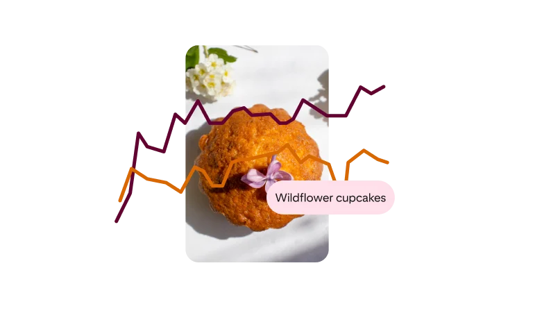 Pin of an orange cupcake with two, overlaid uptrending lines, tagged â€œWildflower cupcakesâ€�.