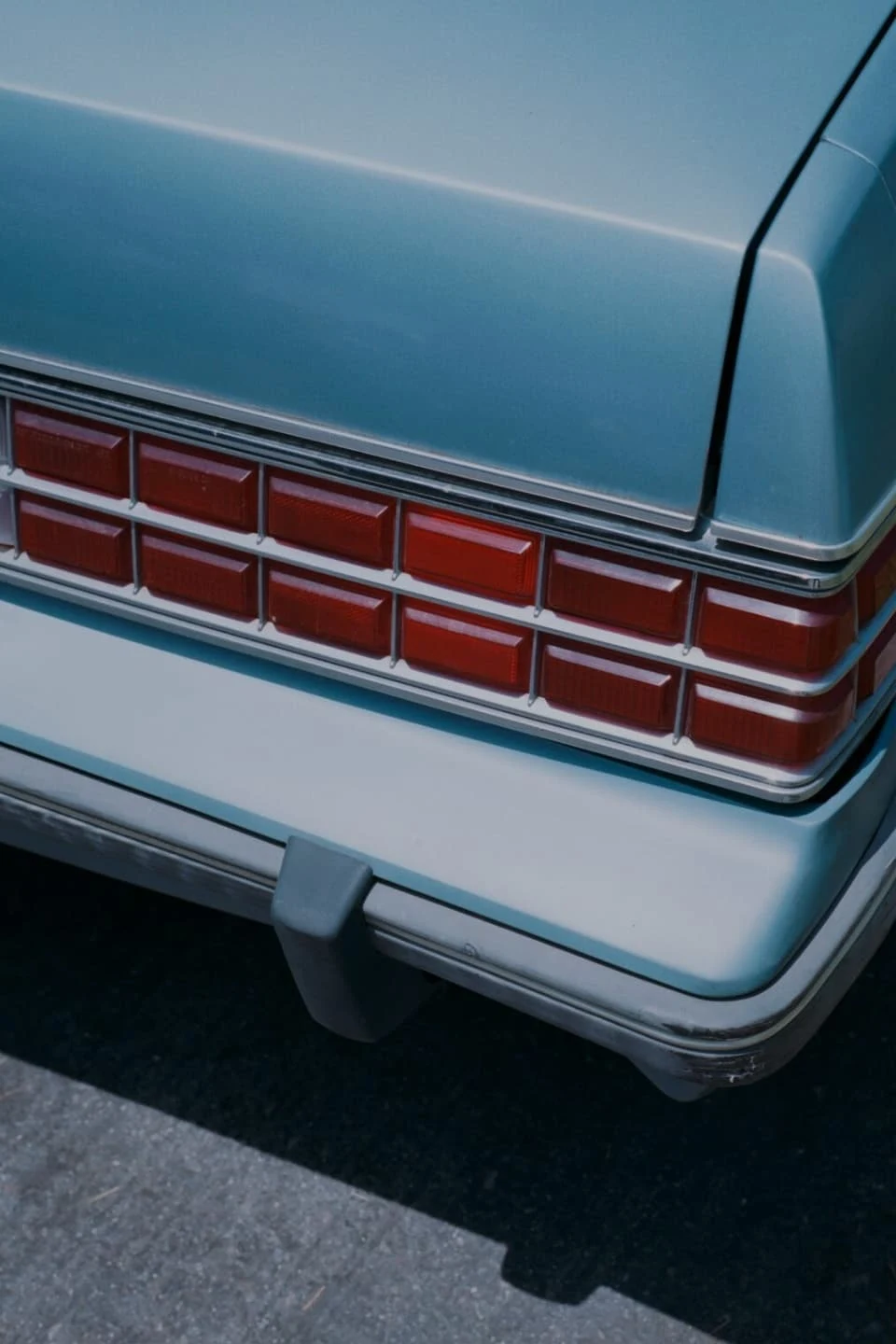 Bumper of a vintage blue car