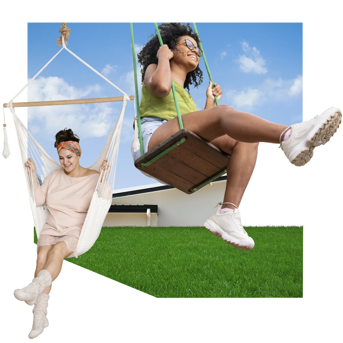 A woman in pink on a hanging chair swing is on the left, kicking up a leg. A woman on the right is in a green top and white shorts on a wooden swing with green handles. Blue sky in the background, bright green grass at the bottom.