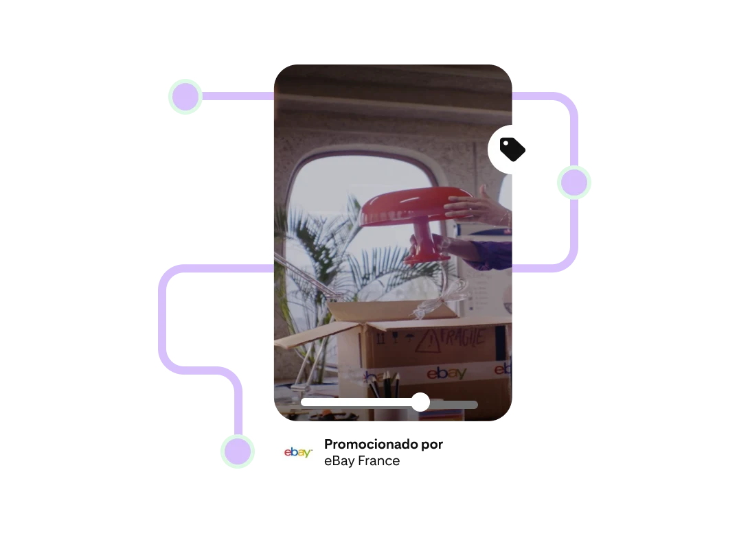 Anuncio con forma de Pin en el que aparecen una lámpara con forma de hongo y una caja con el logotipo de eBay. Una línea serpenteante rosa aparece detrás del Pin. 