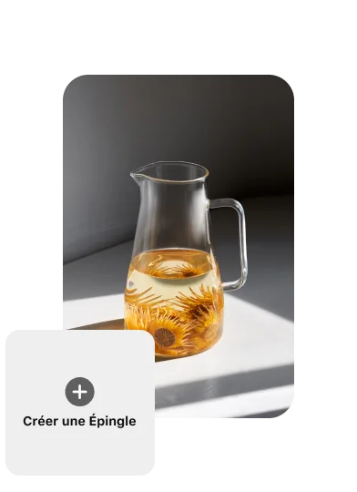 Épingle d’une carafe en verre remplie à moitié d’eau et de fleurs orange, avec un bouton « Créer une épingle » sur la gauche.