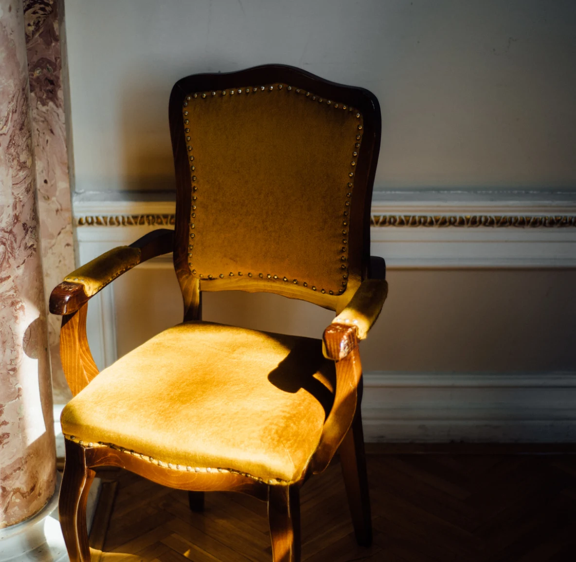 Sunlight cast on an antique armchair