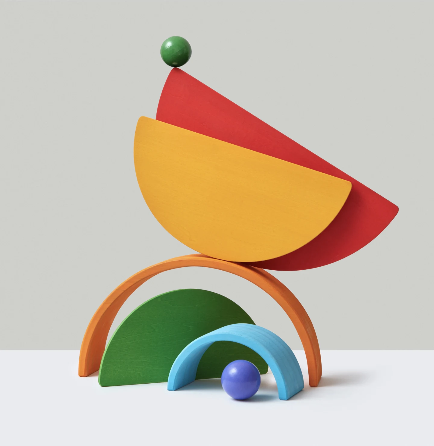 Colorful shapes balanced on top of each other
