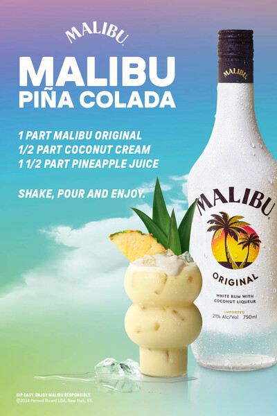 A bottle of Malibu Rums sits near a pina colada, with a recipe for the cocktail/ 