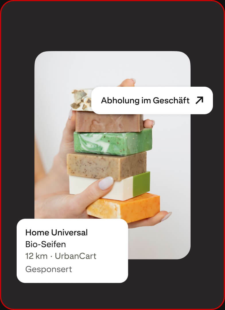 Eine Anzeige zeigt eine Person, die mehrere Stücke Bio-Seife hält, die im Geschäft abgeholt werden können