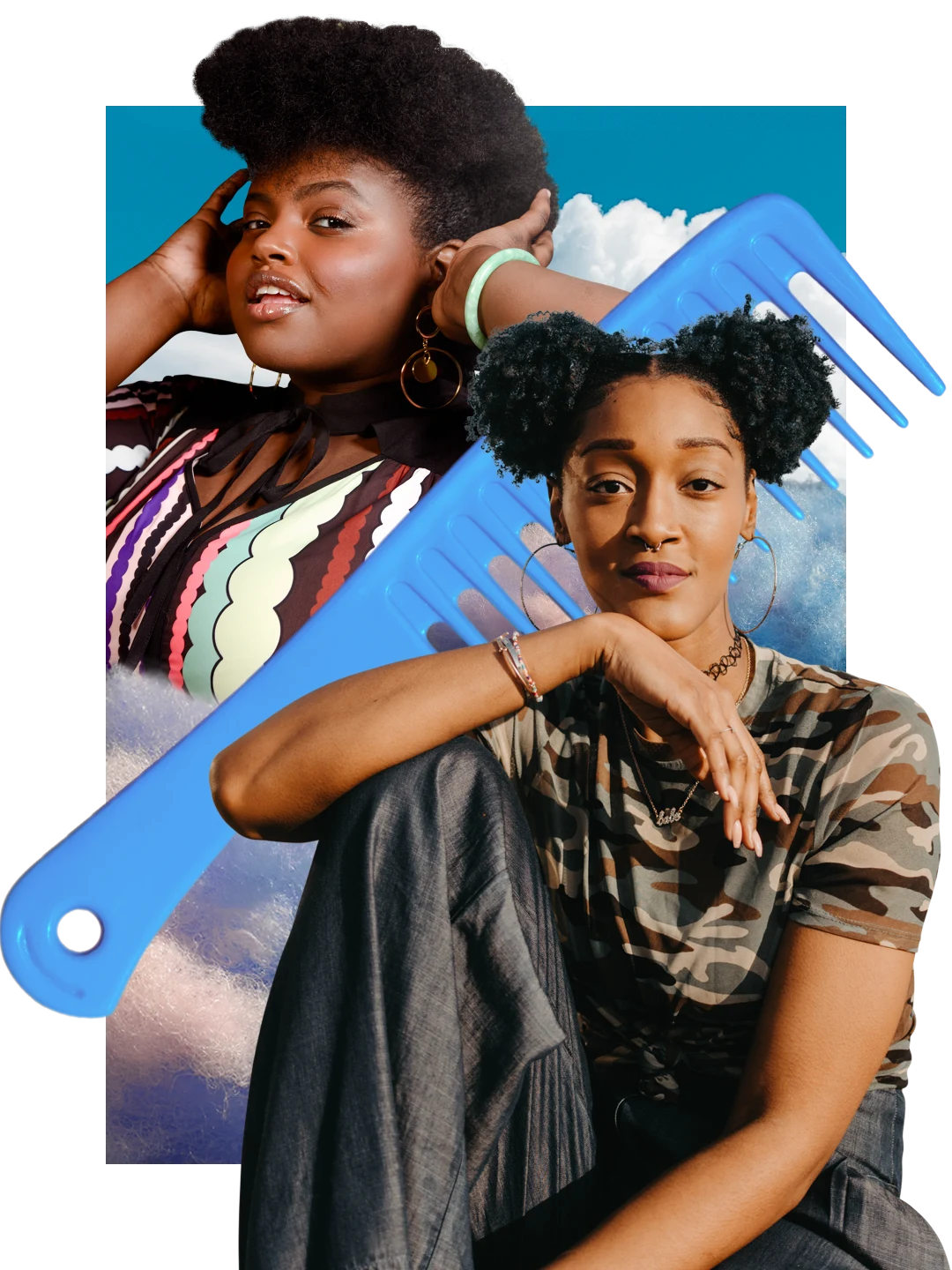 Black woman at right with two natural hair puffs looks at camera, arm propped on her leg. Black woman at left holds her hands to her natural hair. Large blue comb in the middle. Blue sky with white clouds in the background.
