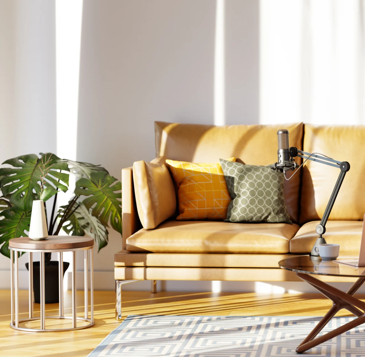 Light, airy living room featuring a light brown leather sofa, monstera plant on a circular end table. round modern coffee table with an industrial-style lamp placed on it.