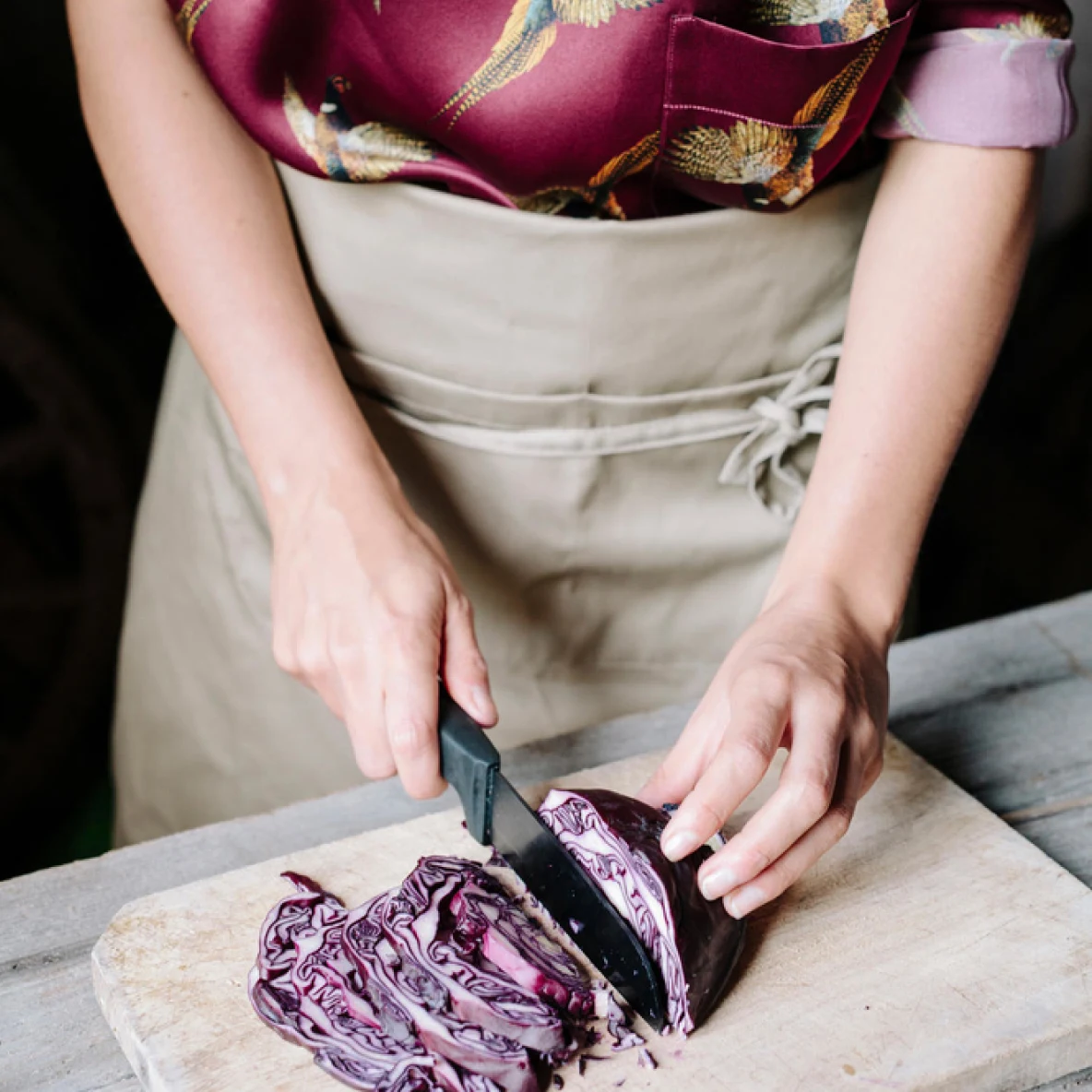 Woman chopping cabbage