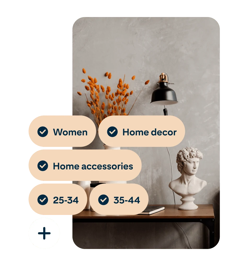 A Pin showing a desk with a vase of orange flowers, a black lamp and a bust of Michelangelo’s David with the search terms Women, Home décor, Home accessories, 25 to 34 and 35 to 44