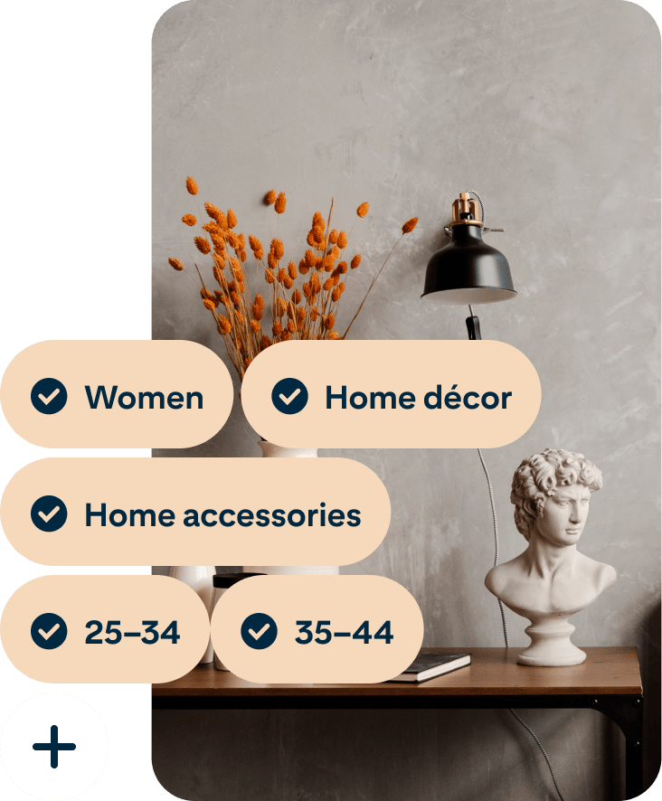 A Pin showing a desk with a vase of orange flowers, a black lamp and a bust of Michelangelo’s David with the search terms Women, Home décor, Home accessories, 25 to 34 and 35 to 44