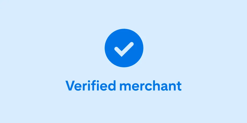 A dark blue tick is centred on a light blue background, with the words ‘Verified merchant’ underneath. 