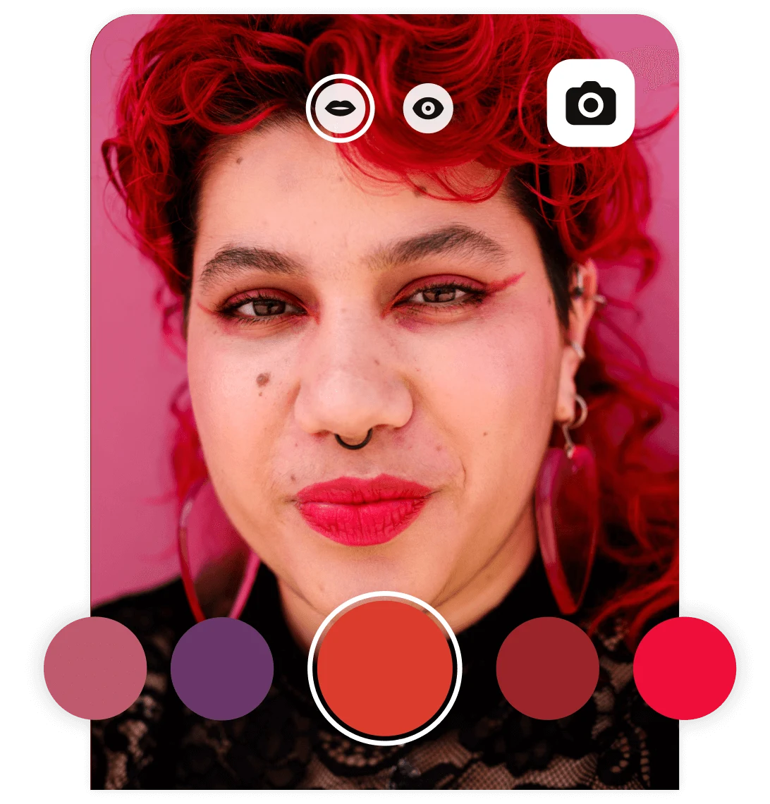 Person with bright, red hair using the virtual try-on feature for different eye and lip make up looks.