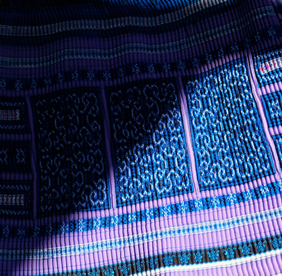 A blue and purple patterned rug