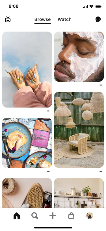 Mobile view of a home feed featuring a variety of Pins such as posed brown hands showing off nail art, a Black man in a face mask, a meal on a plate and outdoor décor.