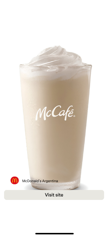 McCafé Argentina ad featuring a tall, creamy iced coffee topped with whipped cream, McCafé logo, and a “Visit site” button.