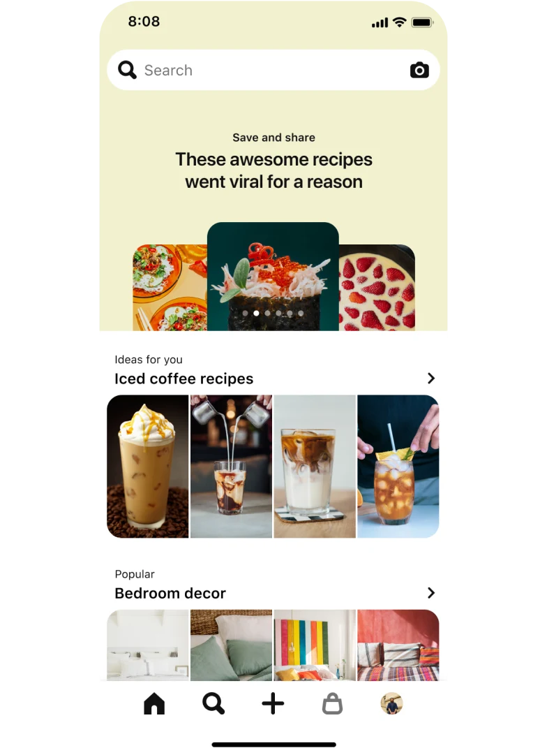 Mobile app search tab with a top-aligned search bar with 3 stacked nail idea pins titled “Pearlescent nails: Shimmer like glitter on the soft side of glam”. Below, a section titled “Ideas for you: Iced Coffee Recipes” with 4 pins and another section titled “Popular: Bedroom decor” with 4 pins.