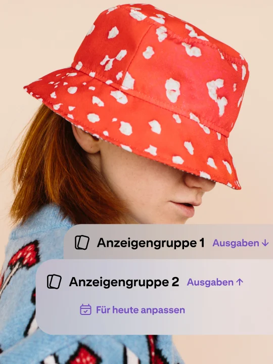 Anzeigengruppenoptionen werden über einem stilisierten Foto angezeigt.