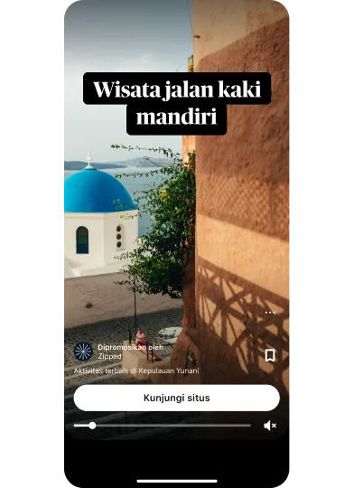 Gambar mini pratinjau iklan ide menampilkan pemandangan perairan Yunani yang indah berjudul “Tur jalan kaki mandiri” dengan tombol “Kunjungi situs” di bagian tengah bawah.