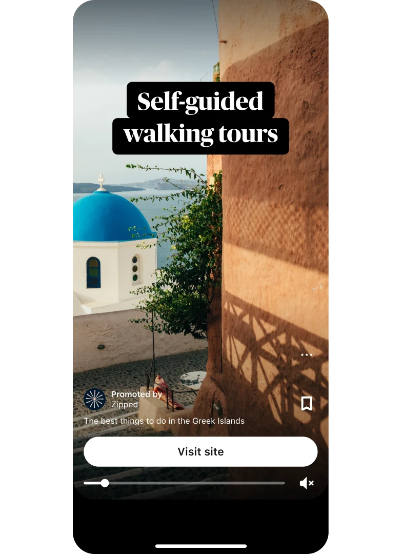 Idea ad preview thumbnail showing a picturesque Grecian water view, with the text ‘Self-guided walking tours’ at the top and a ‘Visit site’ button at the bottom.