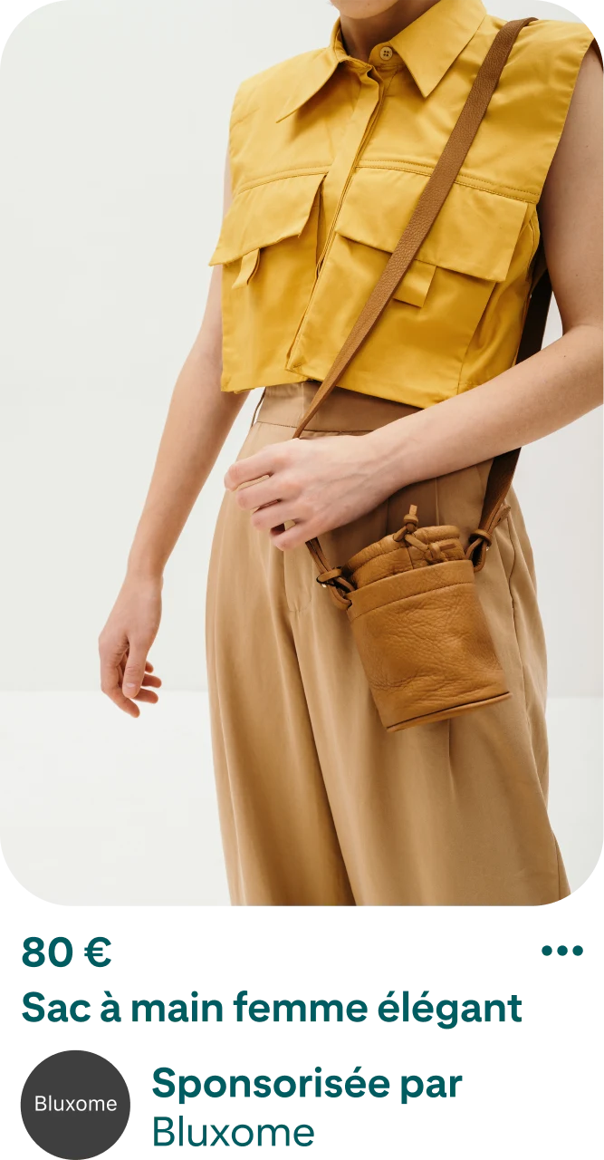 Image d’Épingle promouvant un sac à main pour femme. L’Épingle montre une personne portant à l’épaule un sac à main beige avec une longue bandoulière. La personne porte une chemise jaune sans manches avec col et un pantalon kaki. Le prix et la description du sac sont affichés en dessous de l’image. Le prix est de 80 $ et la description dit : Sac à main tendance pour femme, Sponsorisée par Bluxome. 