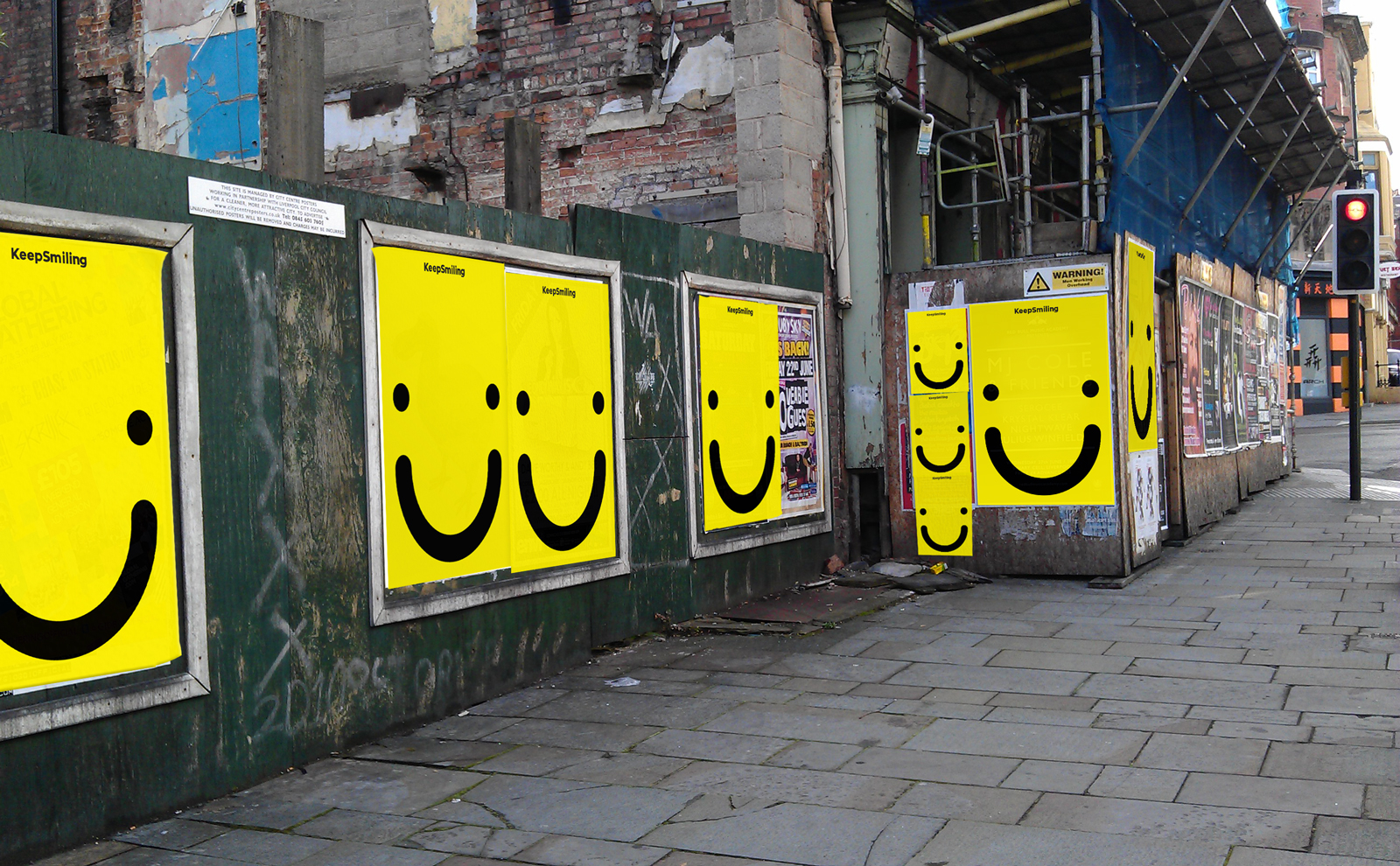 Street with Keep Smiling posters