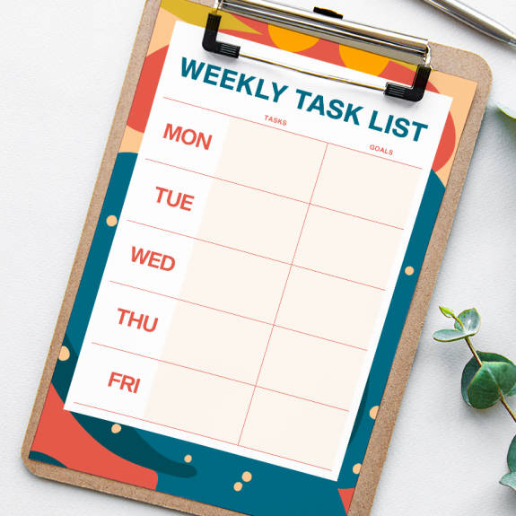 Weekly Task List design on clipboard. 