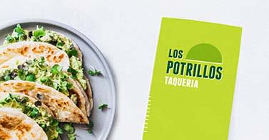 A bright green menu design for “Los Potrillos Taqueria,” next to a plate of tacos. 