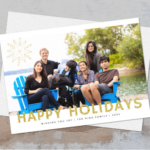 Family Christmas card with image and "HAPPY HOLIDAYS" text.