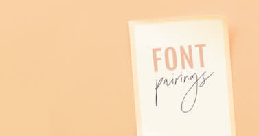 "Font pairings" text on single sheet of paper, set against pastel orange background.
