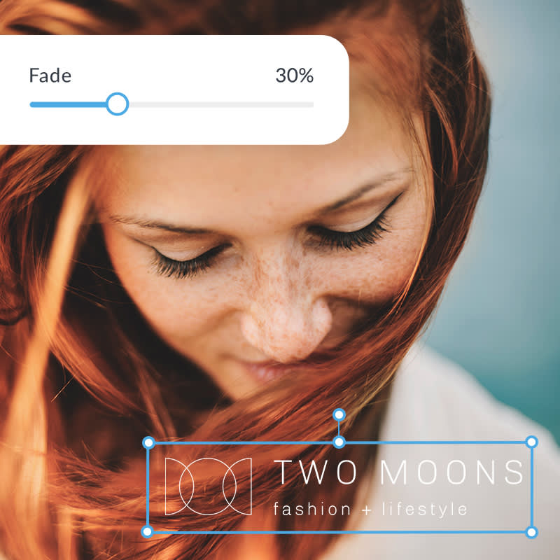 Watermark being added to photo of woman with red hair smiling and looking down. White text reads "Two moons fashion + lifestyle" with geometric moon logo.