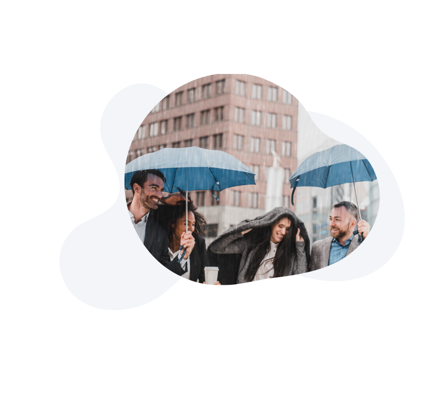 People under umbrellas in business attire. 