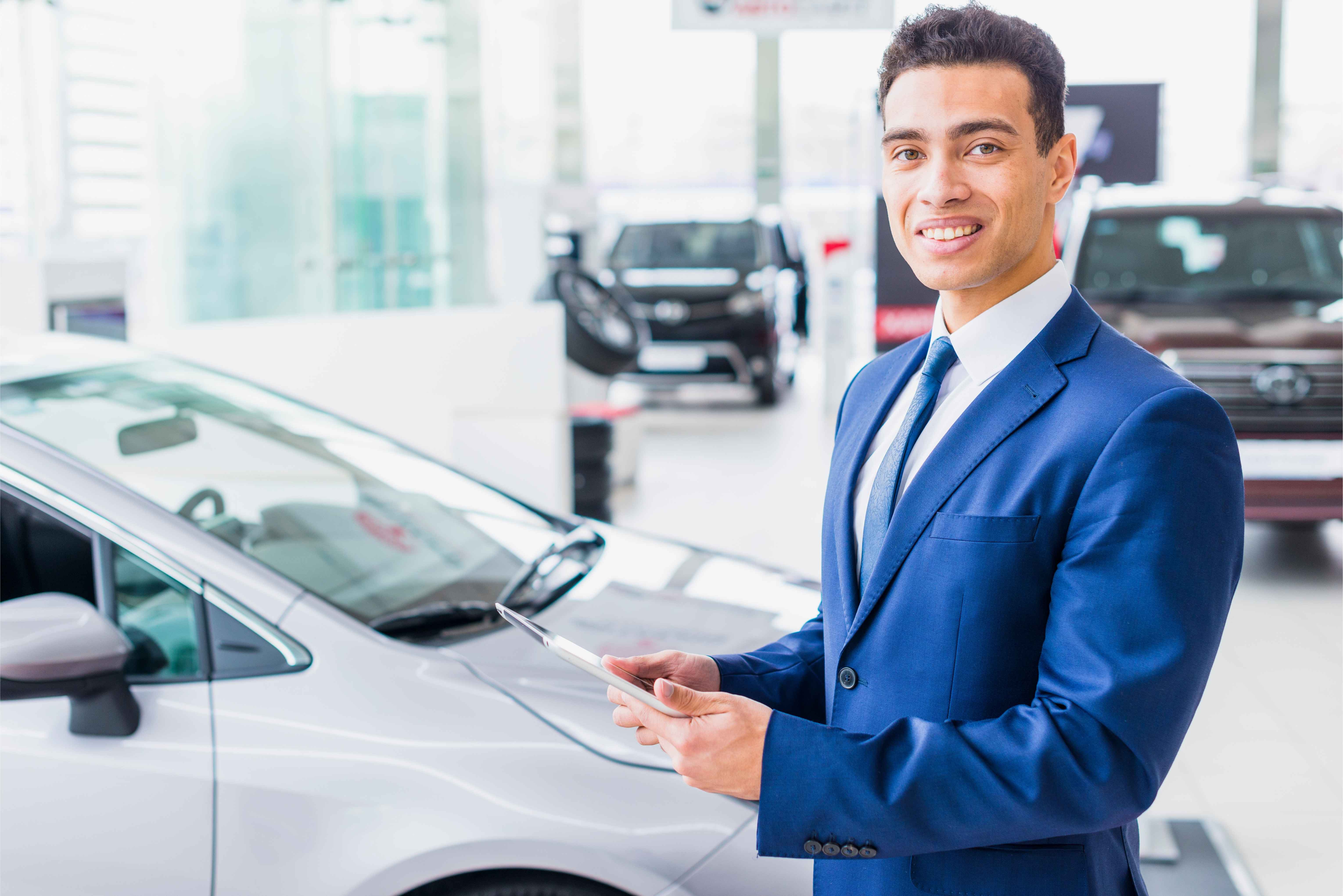 Automotive salesperson using personalized video emails to engage car buyers throughout the sales process, from lead response and appointment scheduling to post-sale follow-up and customer retention.