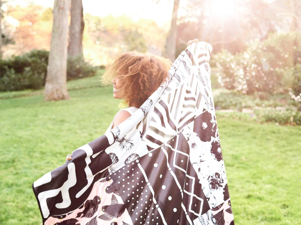 Janelle enjoying the sunshine with a cuddly minky throw blanket