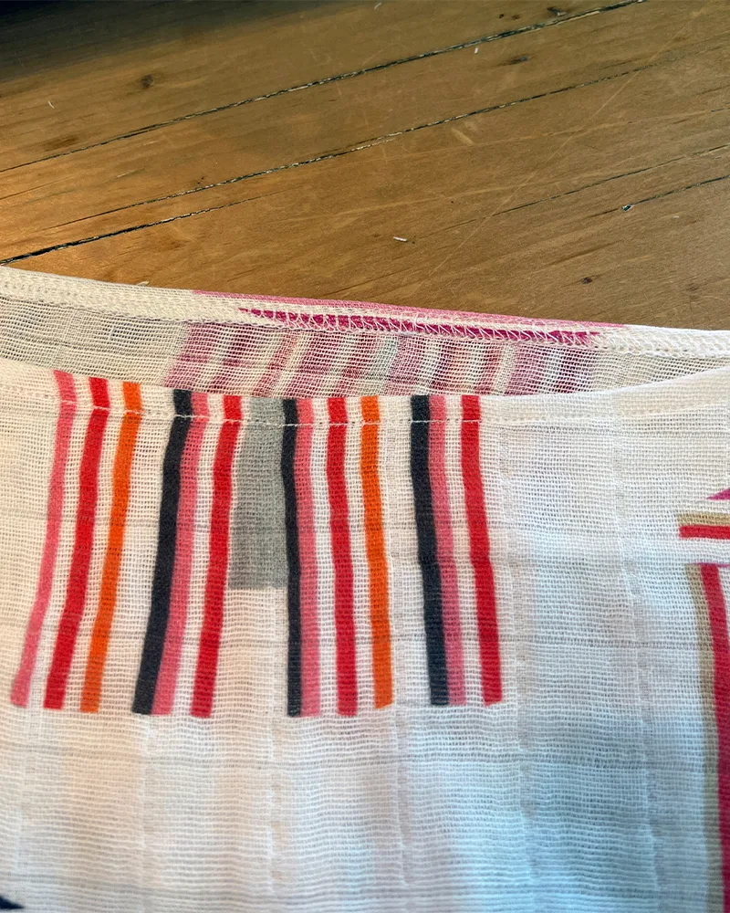 The right side of the finished caftan boatneck neckline.