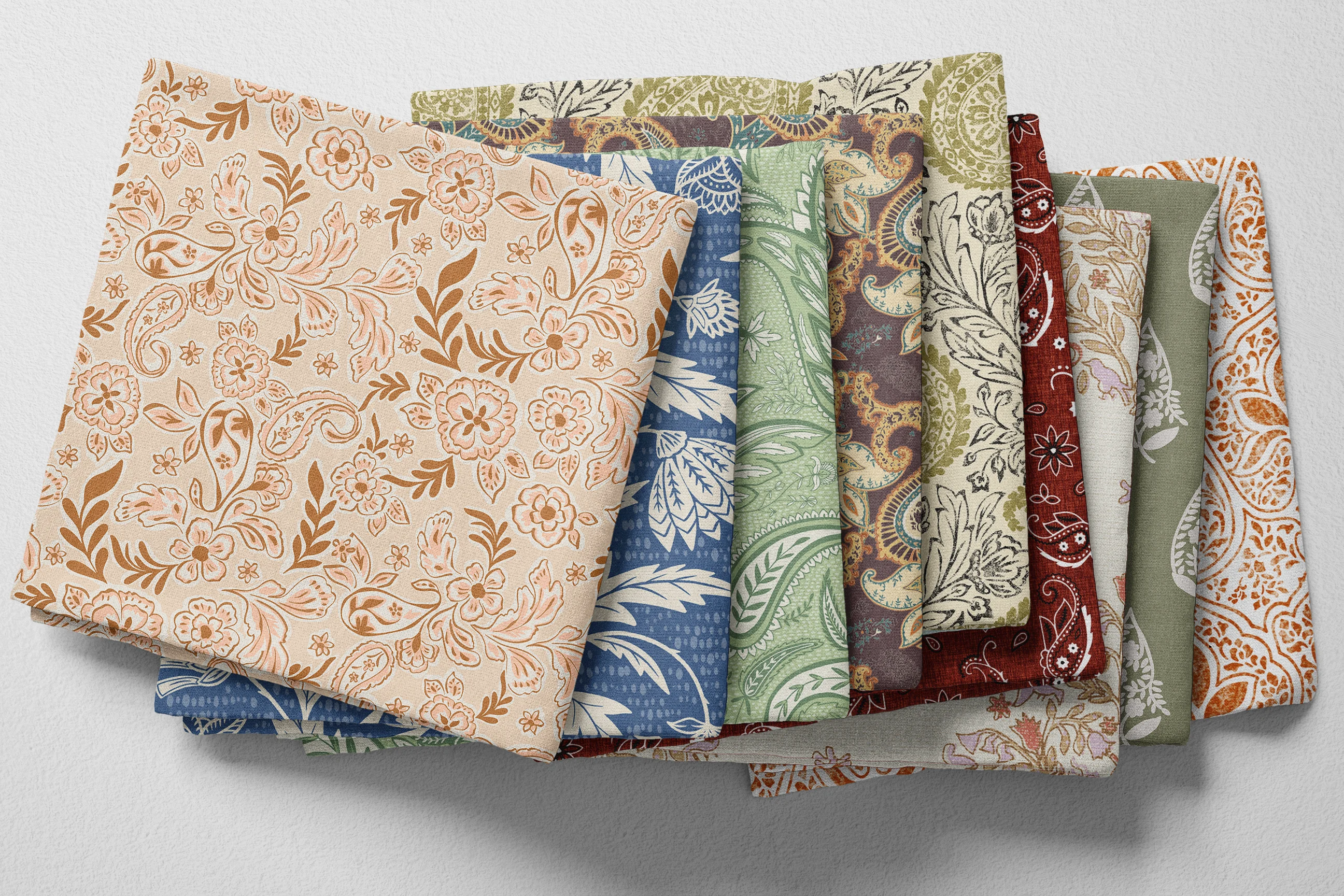 Colorful folded Spoonflower fabric with paisley prints