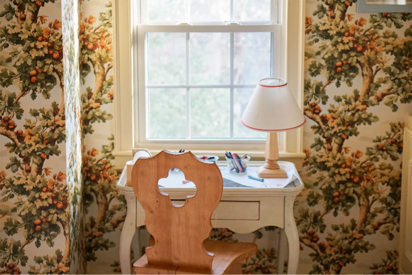 Rustic farmhouse wallpaper with a wooden desk.