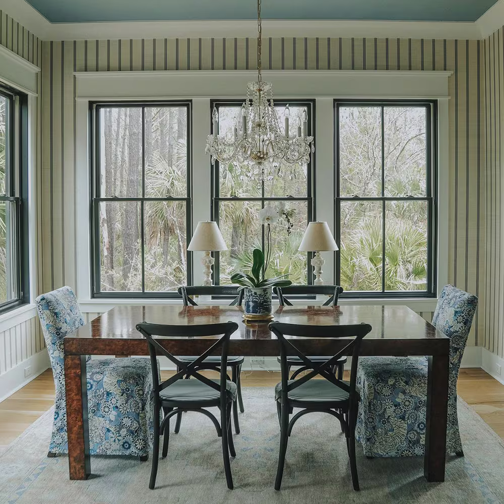 Dining room with striped wallpaper by Spoonflower artist Holli Zollinger.