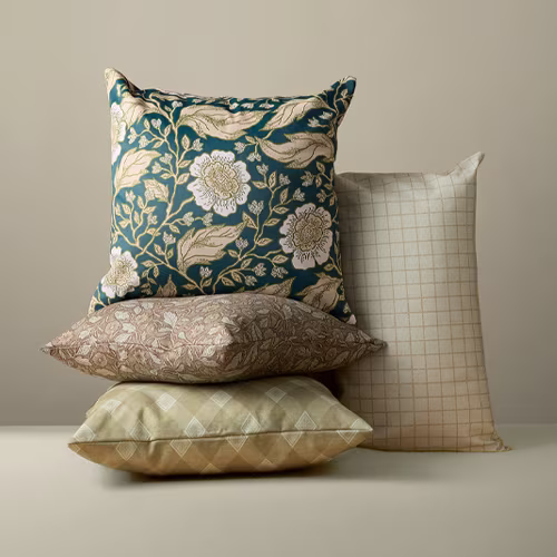 Floral and plaid throw pillows.