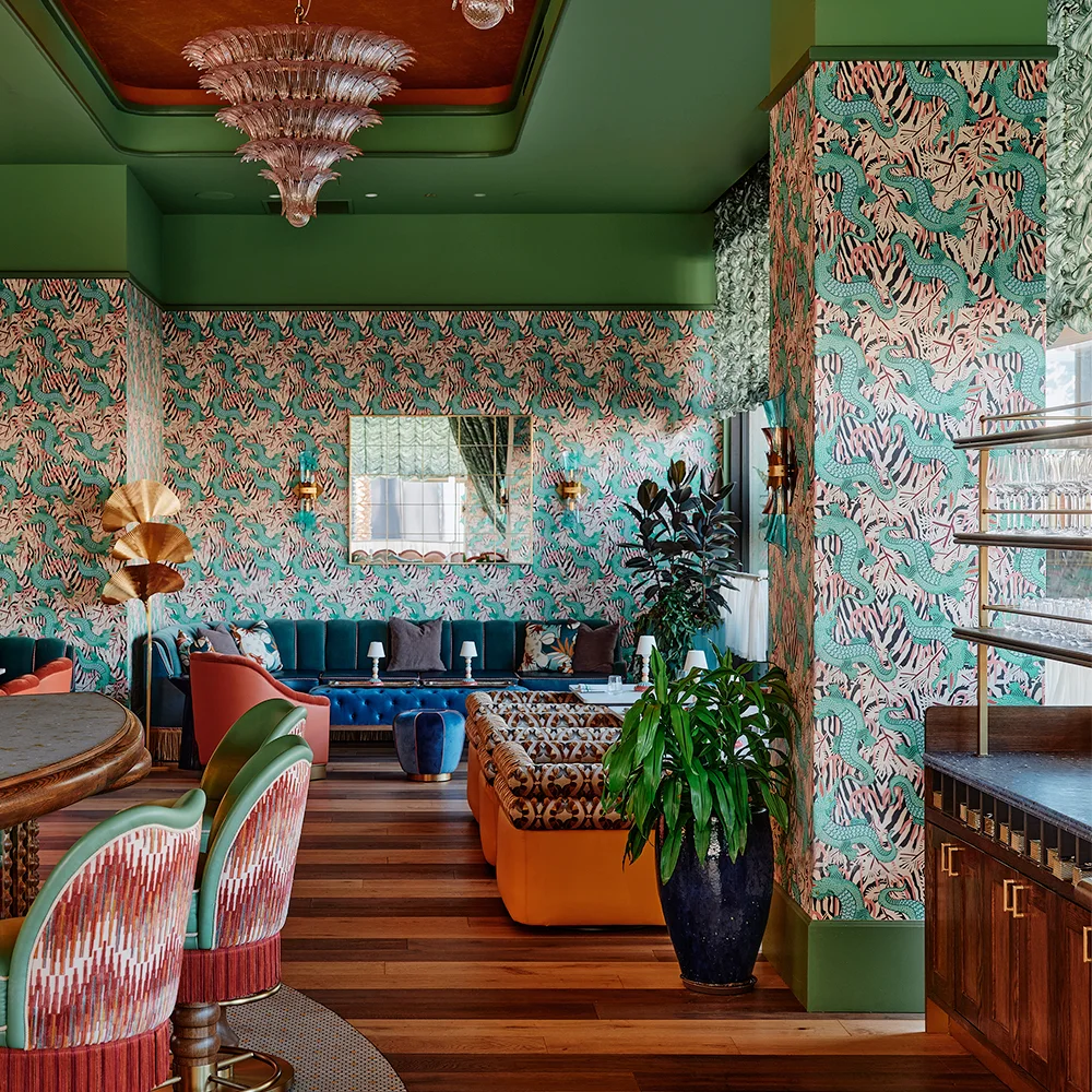 Hotel bar with gator wallpaper.