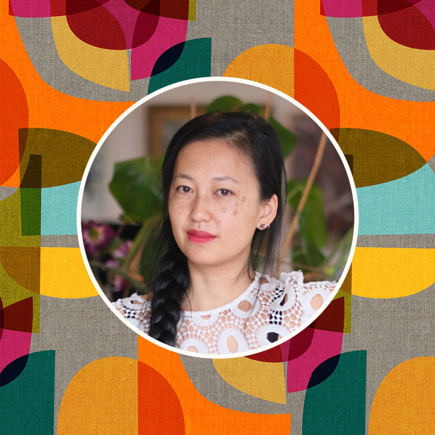 Headshot of Cecilia Mok in front of one of her designed prints.
