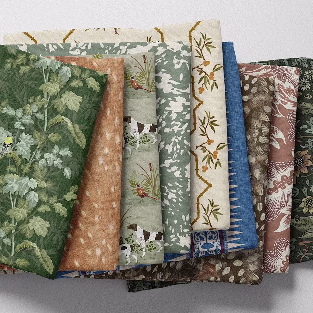 Stack of country calling inspired designs on fabric