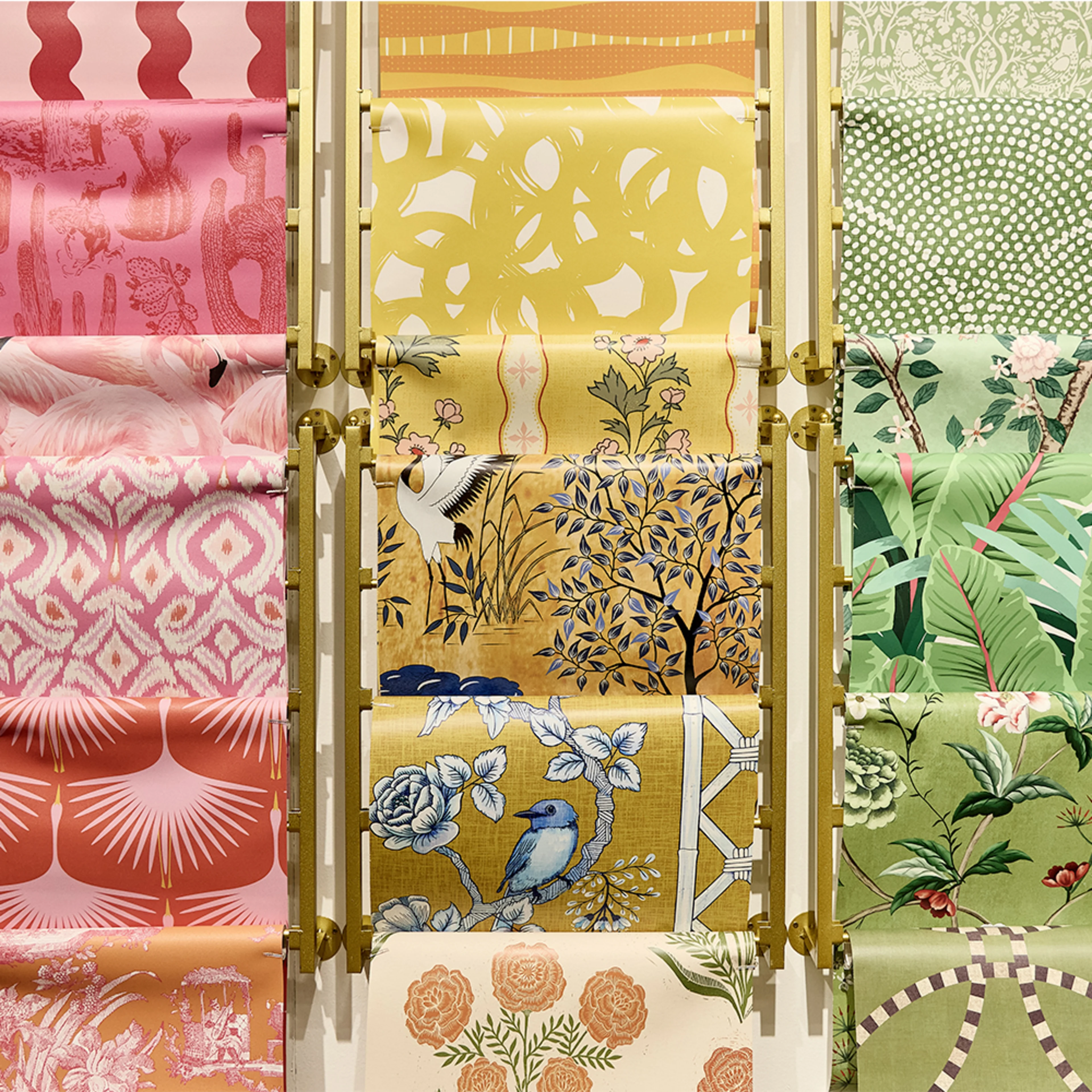 Column of Spoonflower wallpapers in red, yellows and greens all with unique designs at NeoCon 2025.