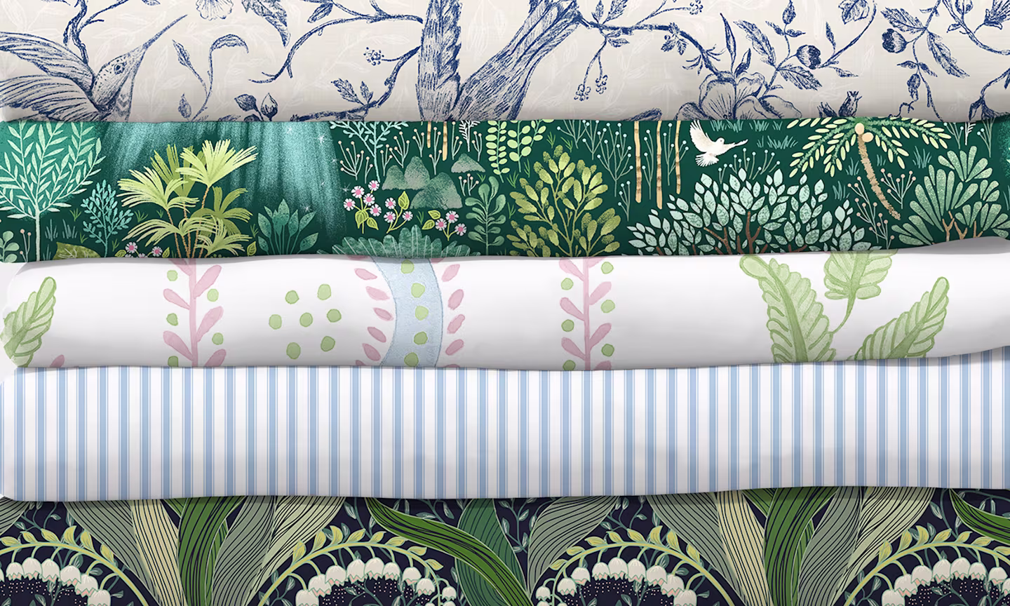 Stack of 5 top selling design on fabric.