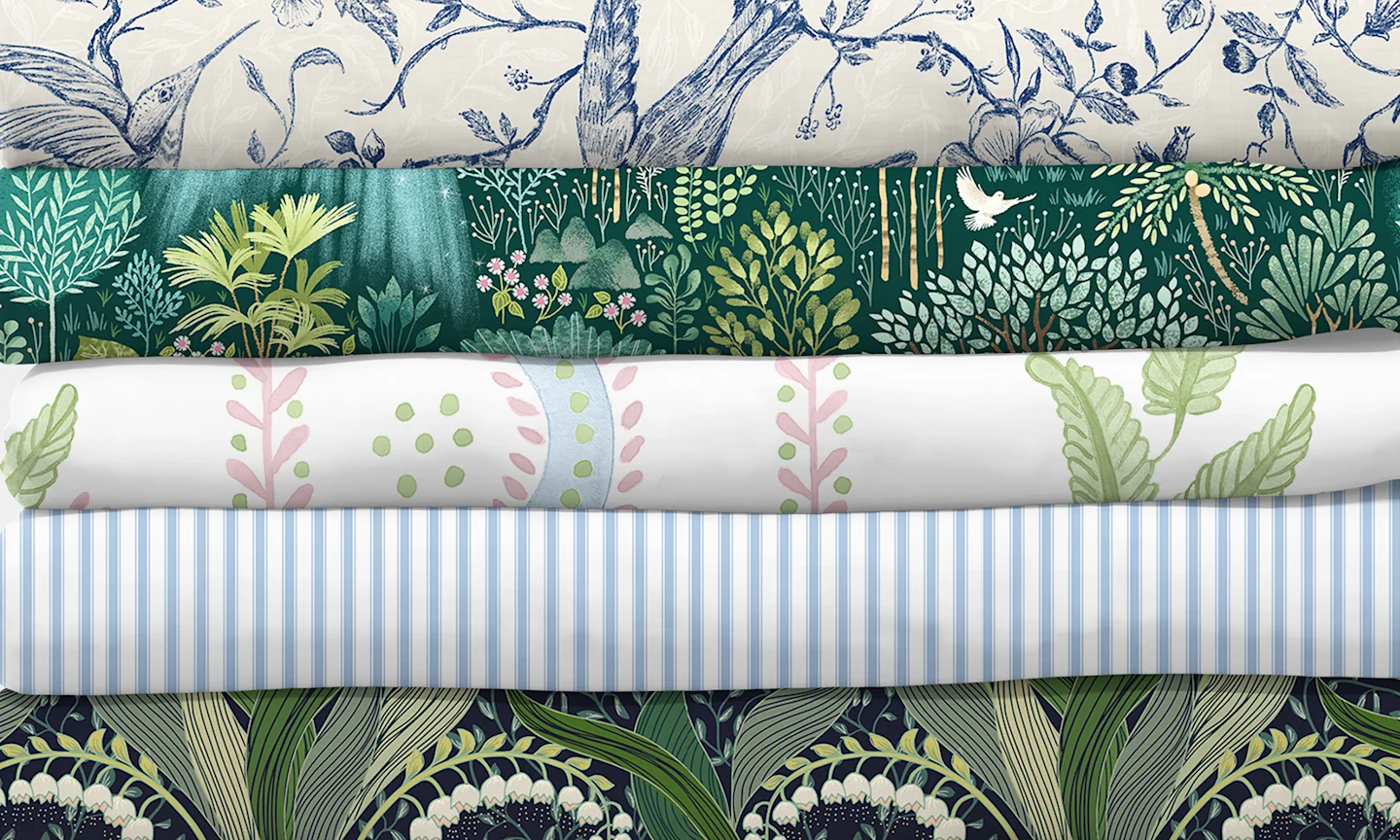 Stack of 5 top selling design on fabric.