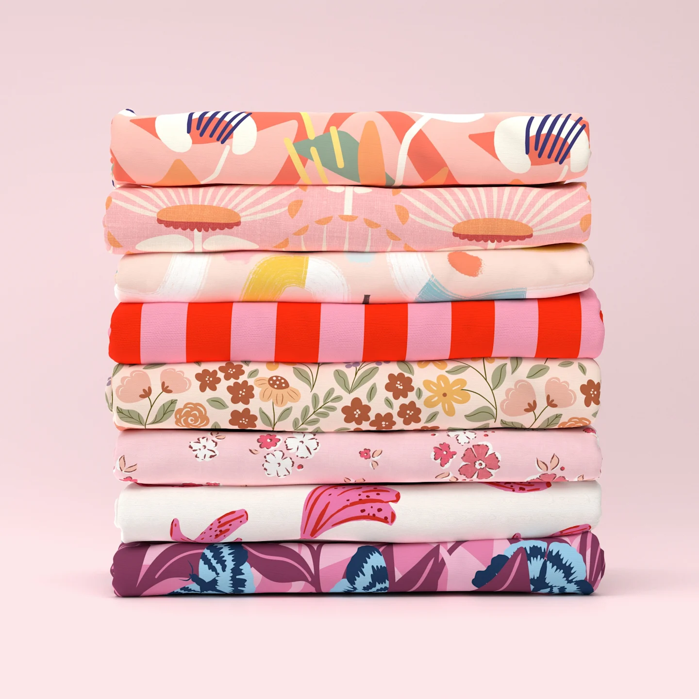 Stack of pink fabrics