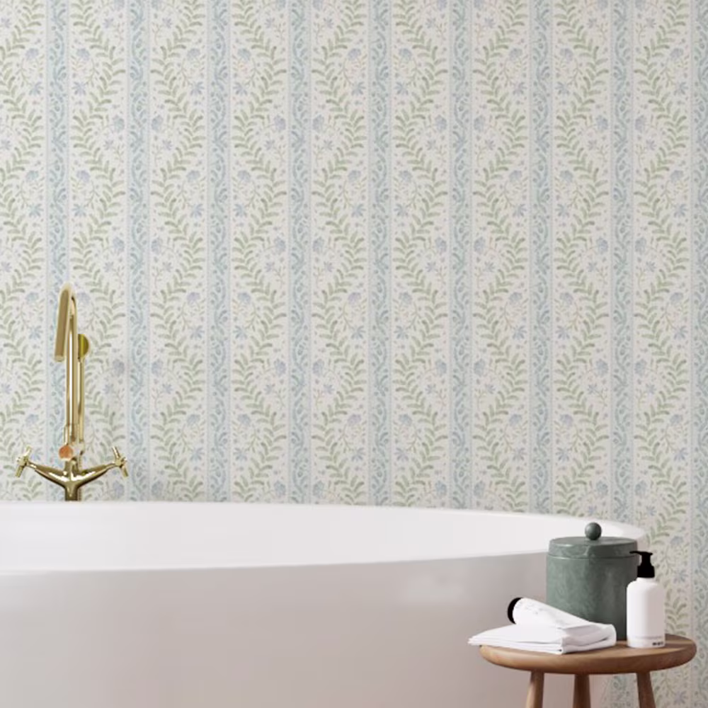 Floral striped wallpaper in a dining area.