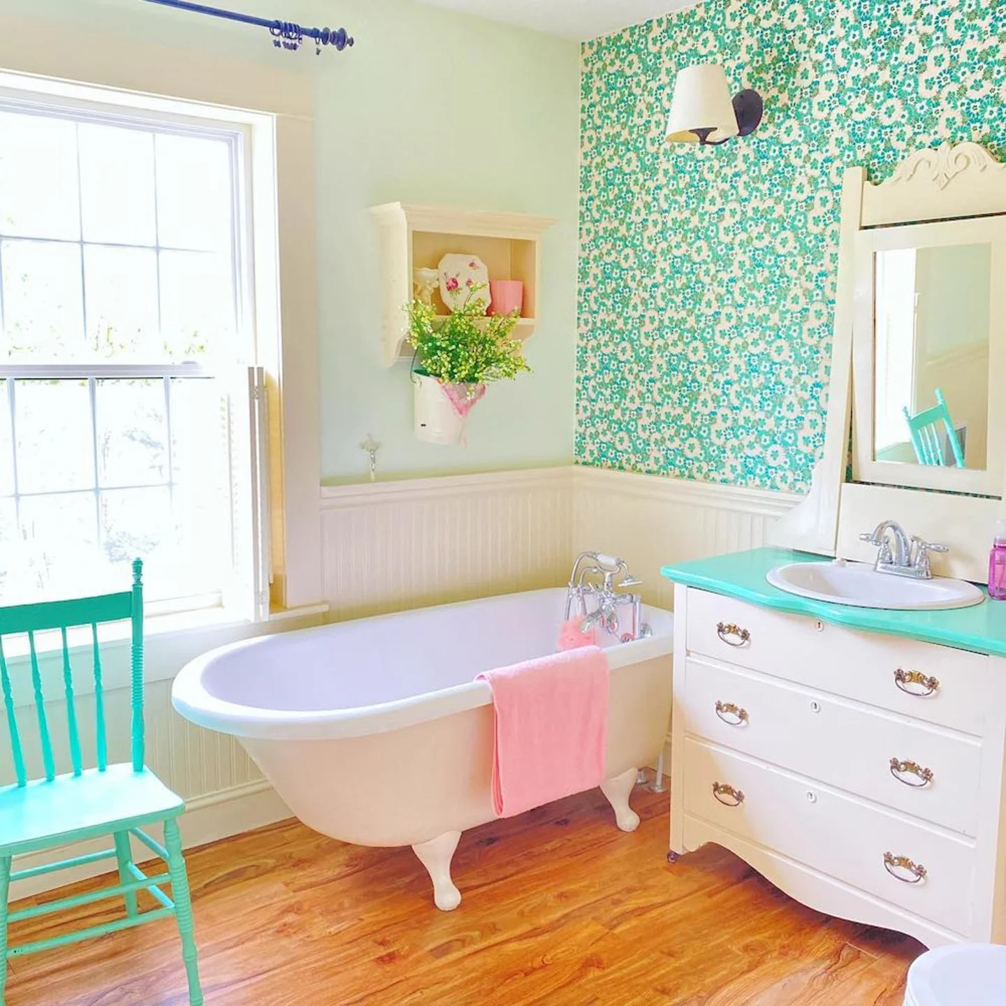 Bathroom with green wallpaper